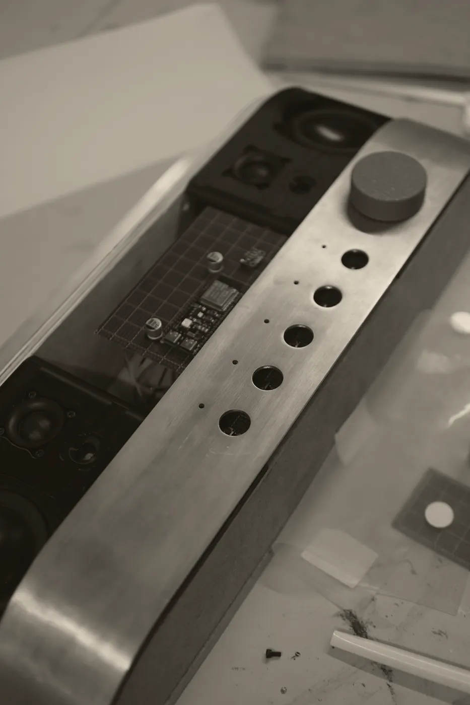 The machined aluminium control panel with the PCB behind it
